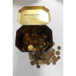 A QE II Ringtons commemorative tin containing early 20th century and later foreign coins