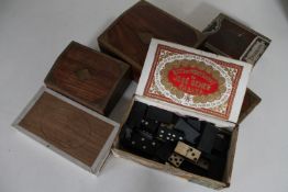 A Havana vintage cigar box containing ivory dominoes, two further cigar boxes,
