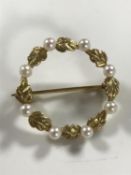 A 9ct gold pearl set brooch, 3.6g.