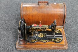 An early 20th century Singer hand sewing machine