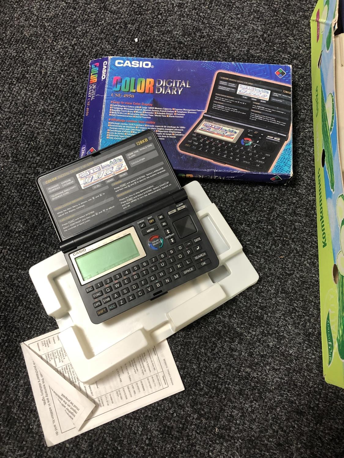 A box of Sony Walkman, Sony FM radio, Casio digital diary, calculators, - Image 3 of 6