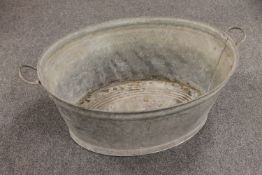 A galvanised wash tub