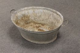 A galvanised wash tub