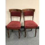 A pair of antique continental mahogany dining chairs