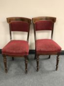 A pair of antique continental mahogany dining chairs