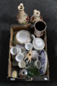 A box of tea china, commemorative glass, pottery vases etc .