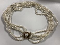 A cultured pearl five stranded collar on 9ct gold clasp,