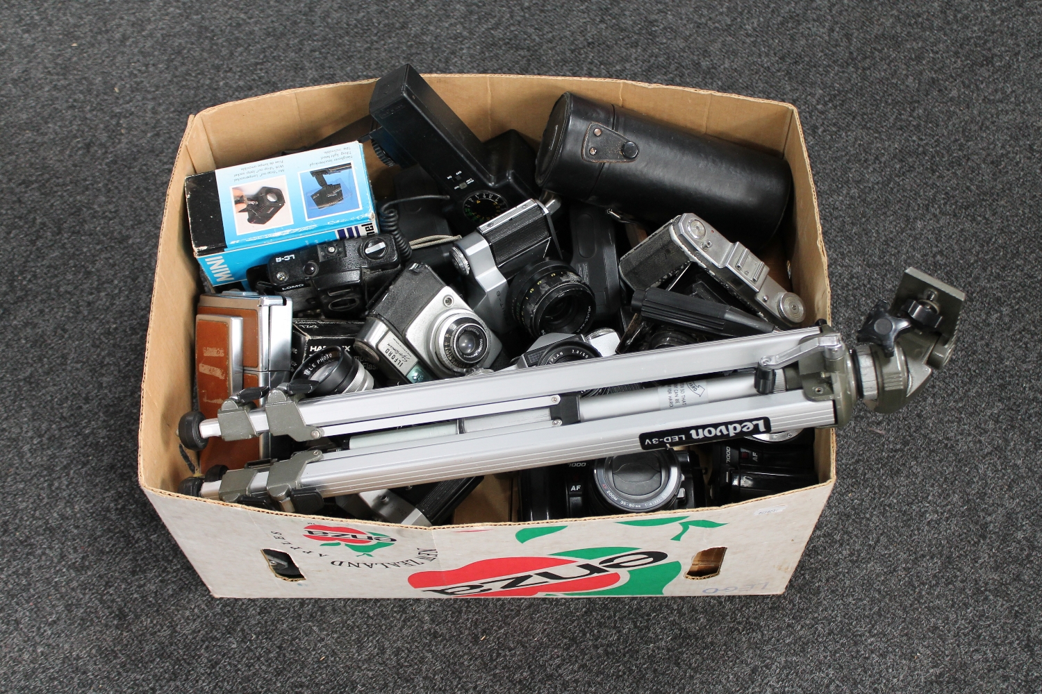 A box of assorted cameras,