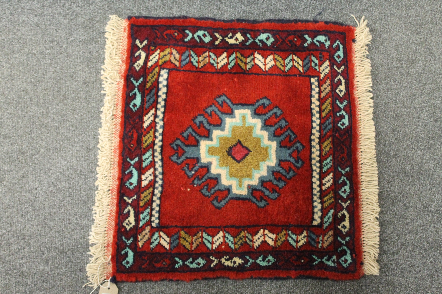 A Caucasian prayer rug,