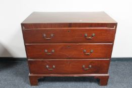 A Victorian mahogany three drawer chest (one foot needs attention)