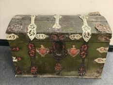 An antique hand painted metal bound trunk