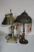 An adjustable brass duplex oil lamp with shade (electric converted) and a copper Art Deco table