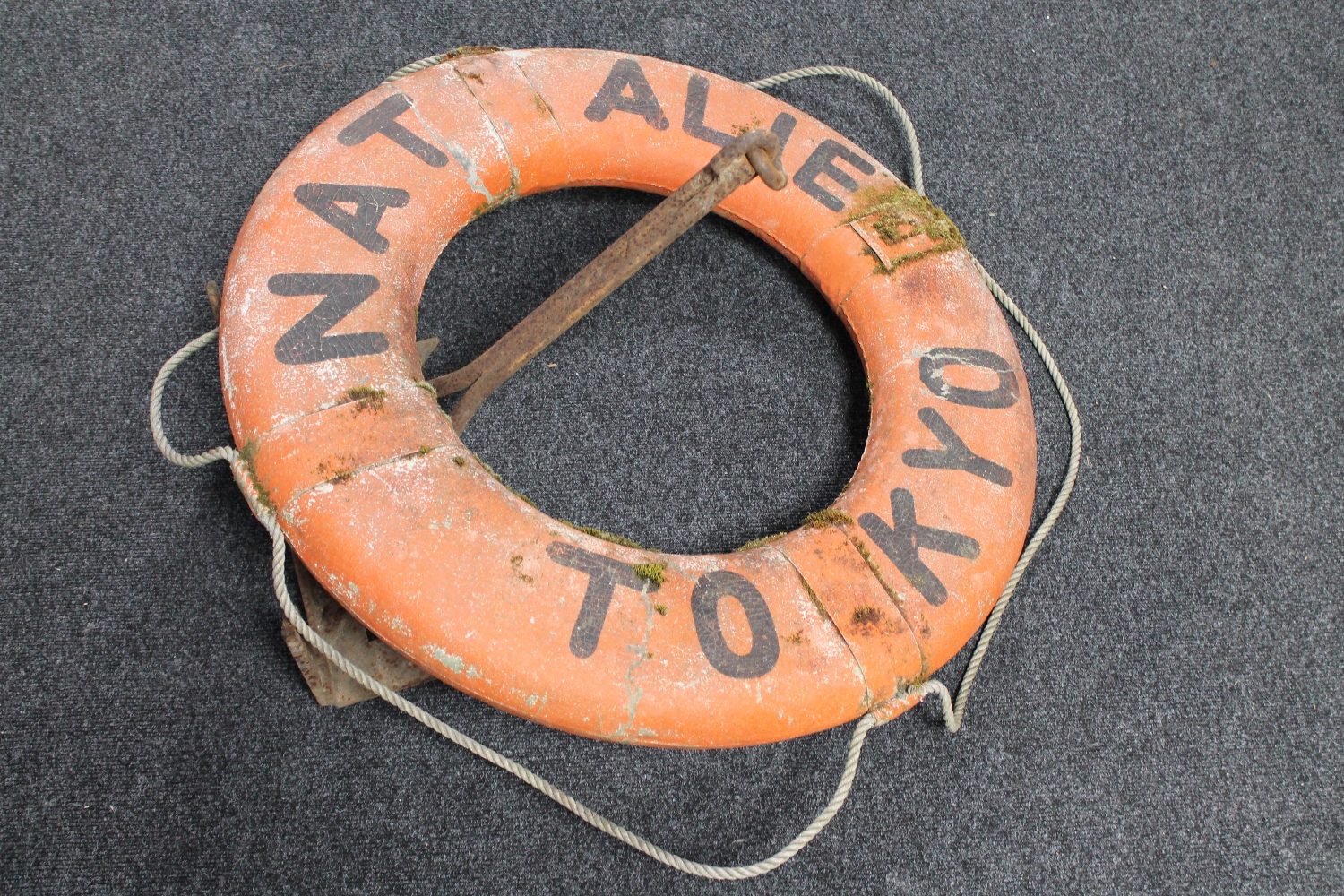 A cast iron anchor and a life ring from the Natalie Tokyo