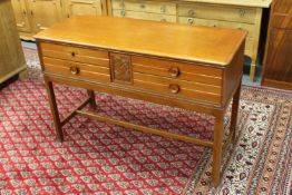 A continental beech four drawer side table