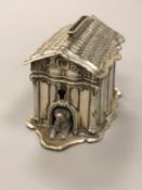 An antique silver dog kennel money box CONDITION REPORT: 9.
