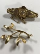 Two 9ct gold brooches, one set with pearls, 9.7g.