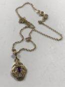 A 9ct gold diamond and amethyst set pendant on 9ct gold chain, 3.7g.