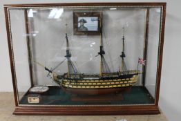 A 1/100 scale model HMS Victory in display case built 1983/84 by S.R.Ashton esquire.