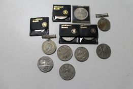 A box of assorted crowns, £5 coin,