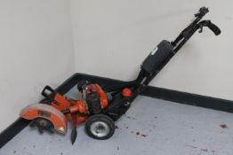 A petrol Tanaka commercial lawn edger