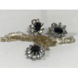 A 9ct gold synthetic sapphire cluster pendant and earring suite
