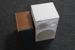A Jamo Compact 90 speaker together with a teak cased Bang & Olufsen speaker