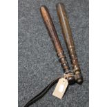Two 20th century police truncheons
