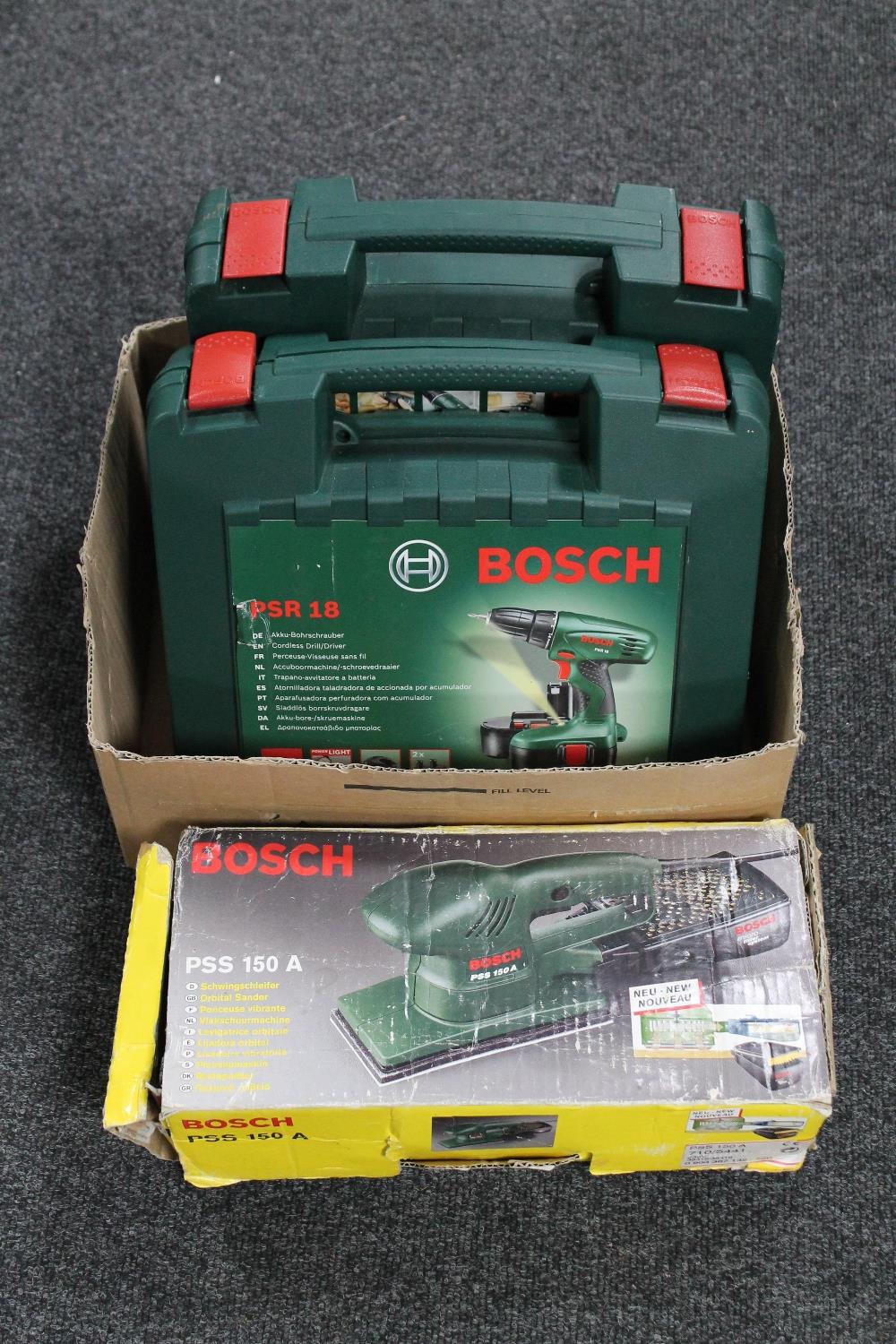 A box containing Bosch sander,