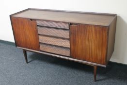 A mid 20th century teak sideboard