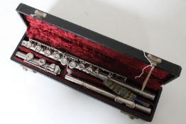 A three piece Embassy chrome flute in fitted box