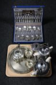 A tray of canteen of plated cutlery, three piece plated Yeoman Plate tea service on tray,