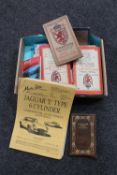 A box of Jaguar E Type parts manual, folded maps,