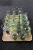 A tray of two-tone glass wine glasses and bowls