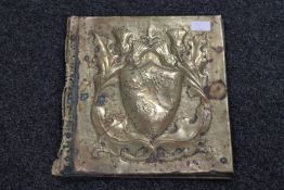 A Scottish brass embossed book cover