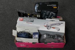 A box containing Performance angle grinder, Powercraft jigsaw,