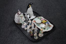 A tray of assorted continental figures, a Beswick Beatrix Potter figure "Ginger", Poole penguin,