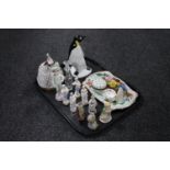 A tray of assorted continental figures, a Beswick Beatrix Potter figure "Ginger", Poole penguin,
