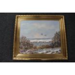 A 20th century gilt framed oil on canvas, signed N K Niels - ducks in flight,
