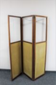 An Edwardian mahogany three-way folding room divider (one glass panel missing)