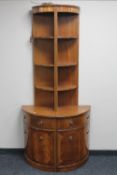 A pair of late 20th century inlaid mahogany corner stands