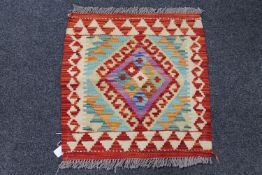 A Choli kilim mat,