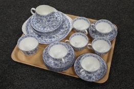 A tray containing a twenty-one piece Minton Shalimar china tea service