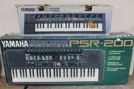 A boxed Yamaha Portatone PSR.