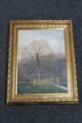 A gilt framed continental school on canvas - gate with woodland beyond,