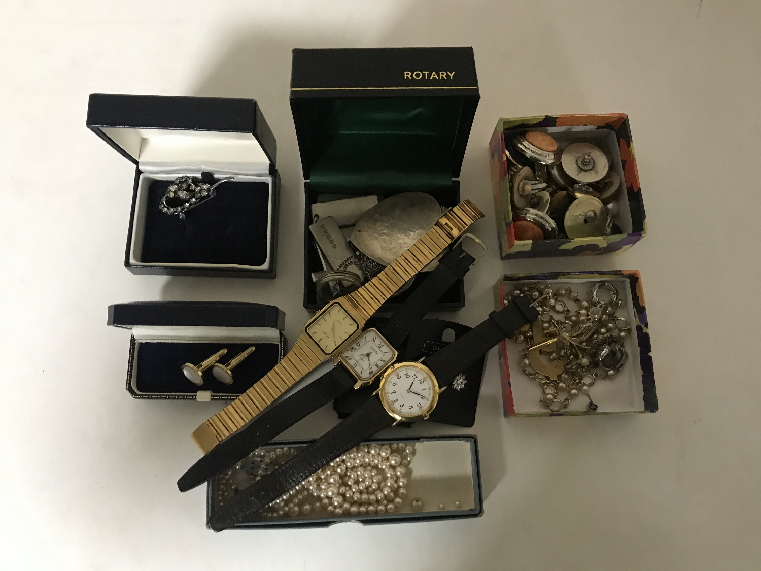 A box of costume jewellery, wristwatches,