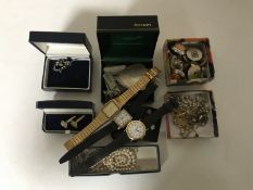 A box of costume jewellery, wristwatches,