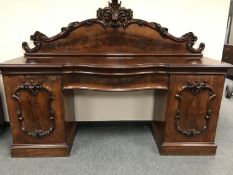 A Victorian mahogany pedestal serpentine fronted sideboard, width 215 cm.