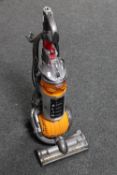 A Dyson DC24 upright vacuum cleaner