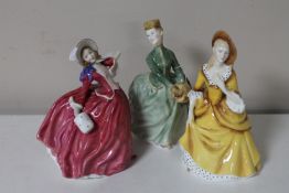 Three Royal Doulton figures; Sandra HN 2275,