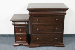 A contemporary mahogany four drawer Victorian style chest together with matching three drawer